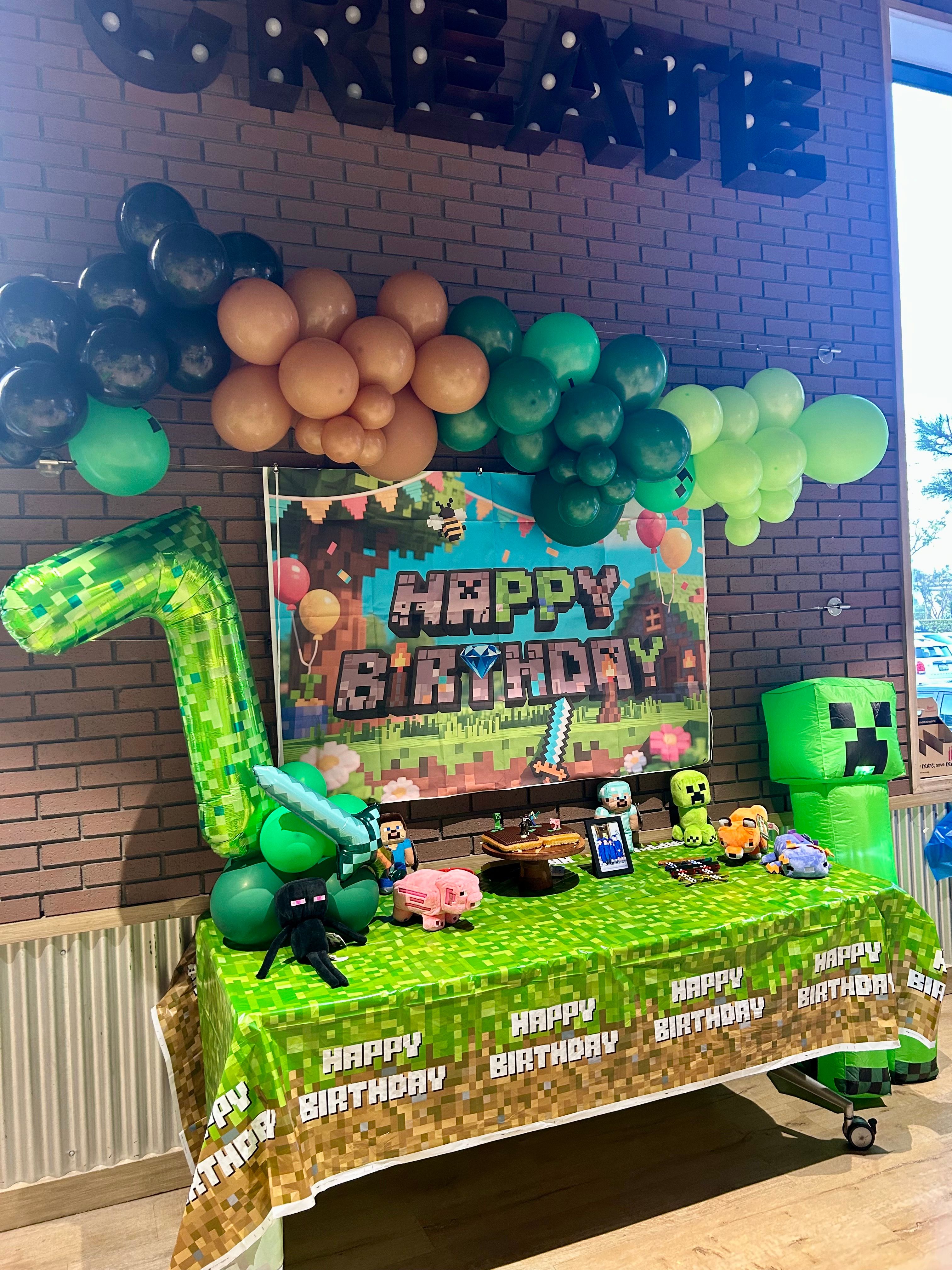 Minecraft themed balloon party setup with colorful balloons
